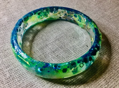 Ocean’s Muse” – Handcrafted Blue-Green Fantasy Fish Resin Bangle