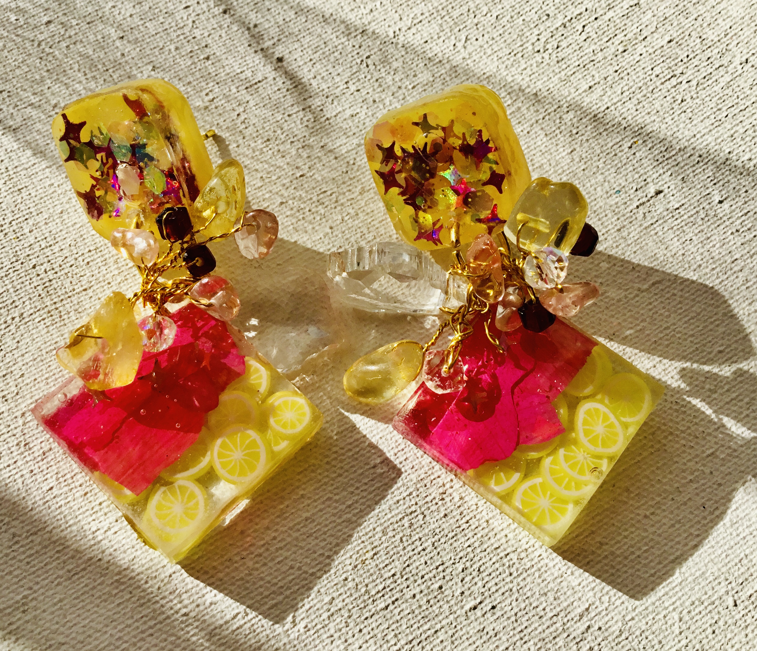 lemon earrings, citrus earrings, flower resin jewelry, real flower earrings, botanical jewelry, summer earrings, glow earrings, glow in dark, handmade earrings, resin earrings, statement earrings, fruit jewelry, lemon jewelry, citrus jewelry, citrine beads, ruby beads, glitter earrings, boho earrings, unique gift, gift for her, summer jewelry, nature jewelry, floral earrings, artisan jewelry, lightweight earrings, festival jewelry, beach earrings, romantic gift, dainty statement, handmade resin